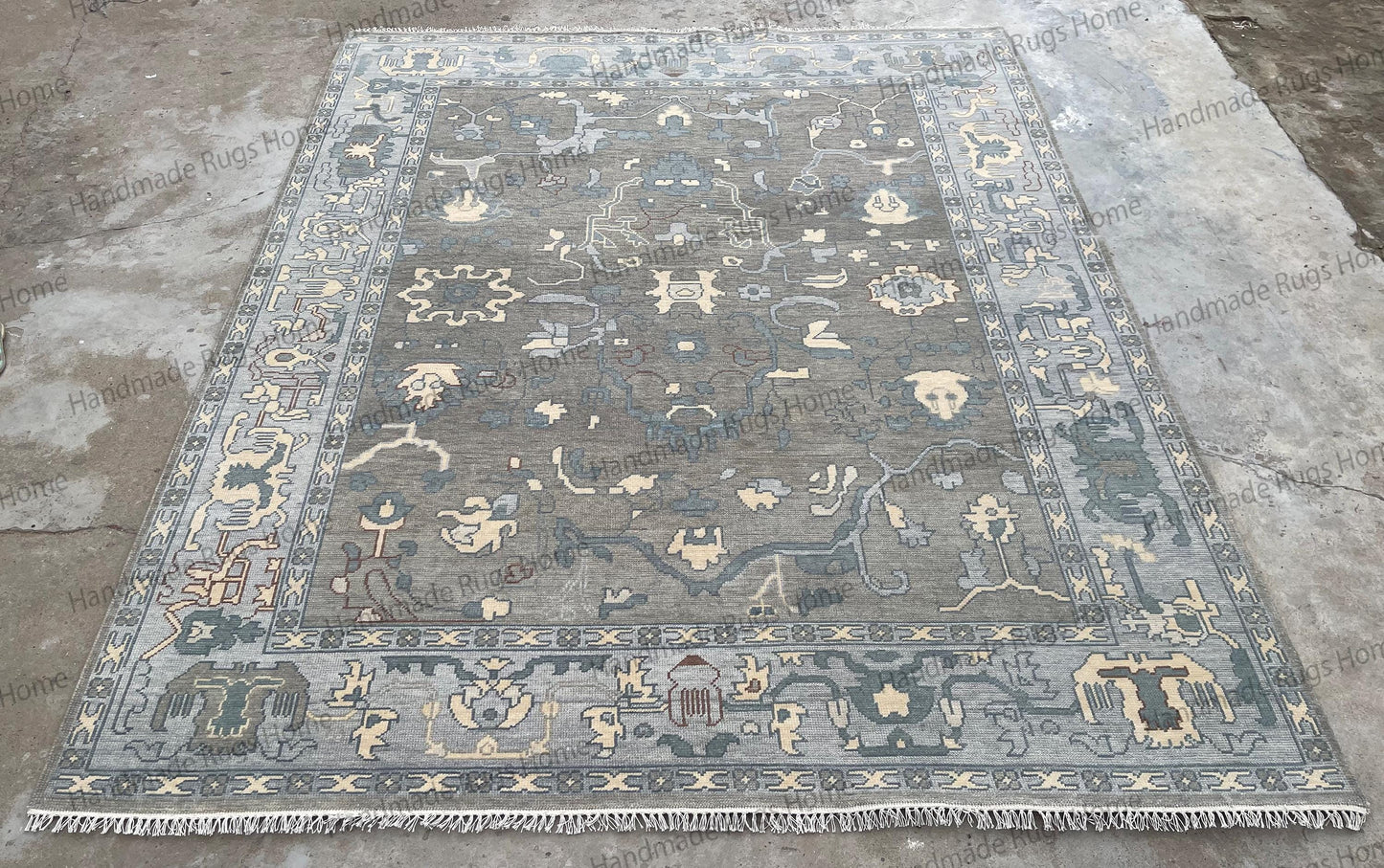 Neutral tone hand knotted carpet perfect for bedroom or living area