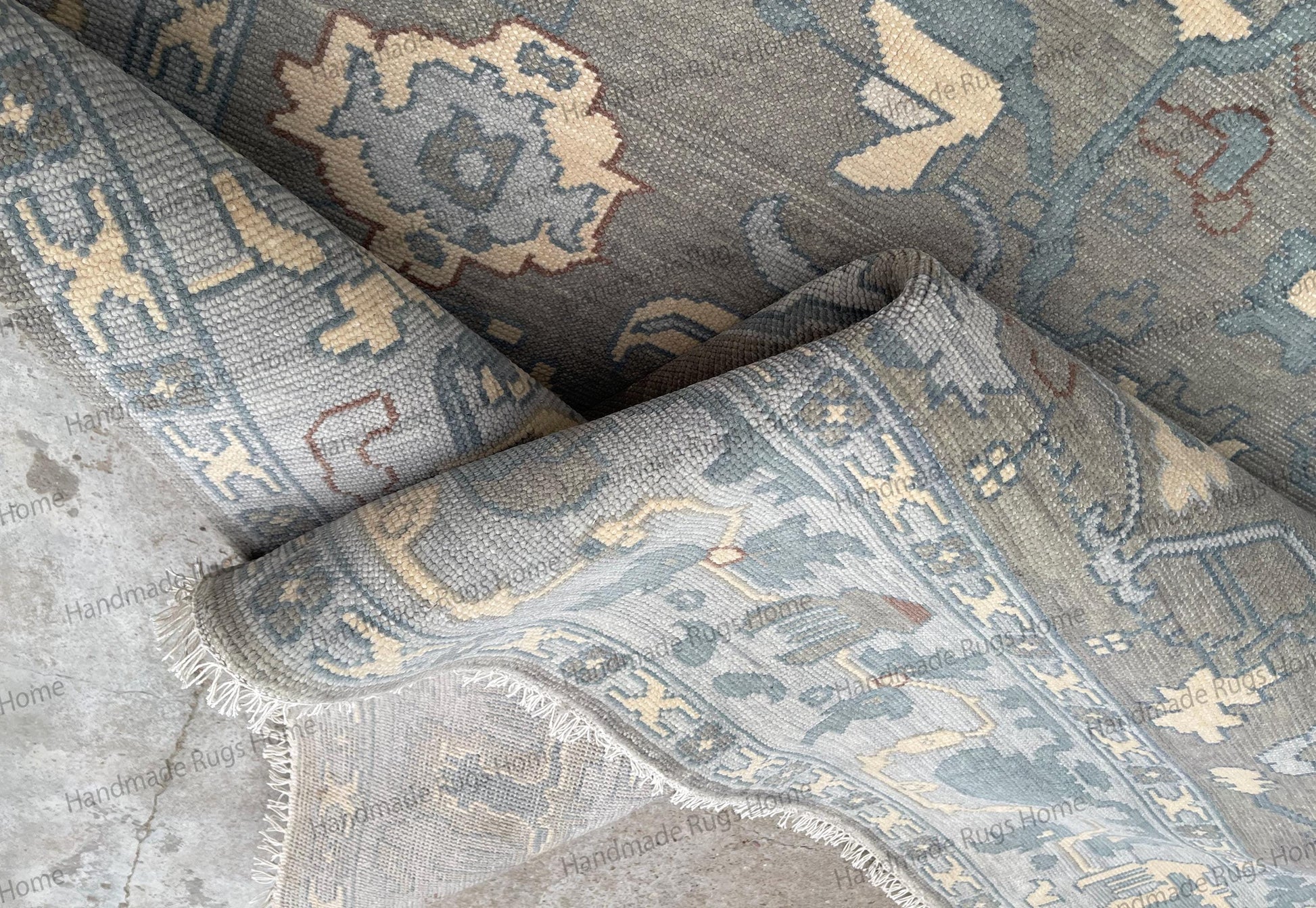 Traditional hand knotted Oushak rug with antique inspired look
