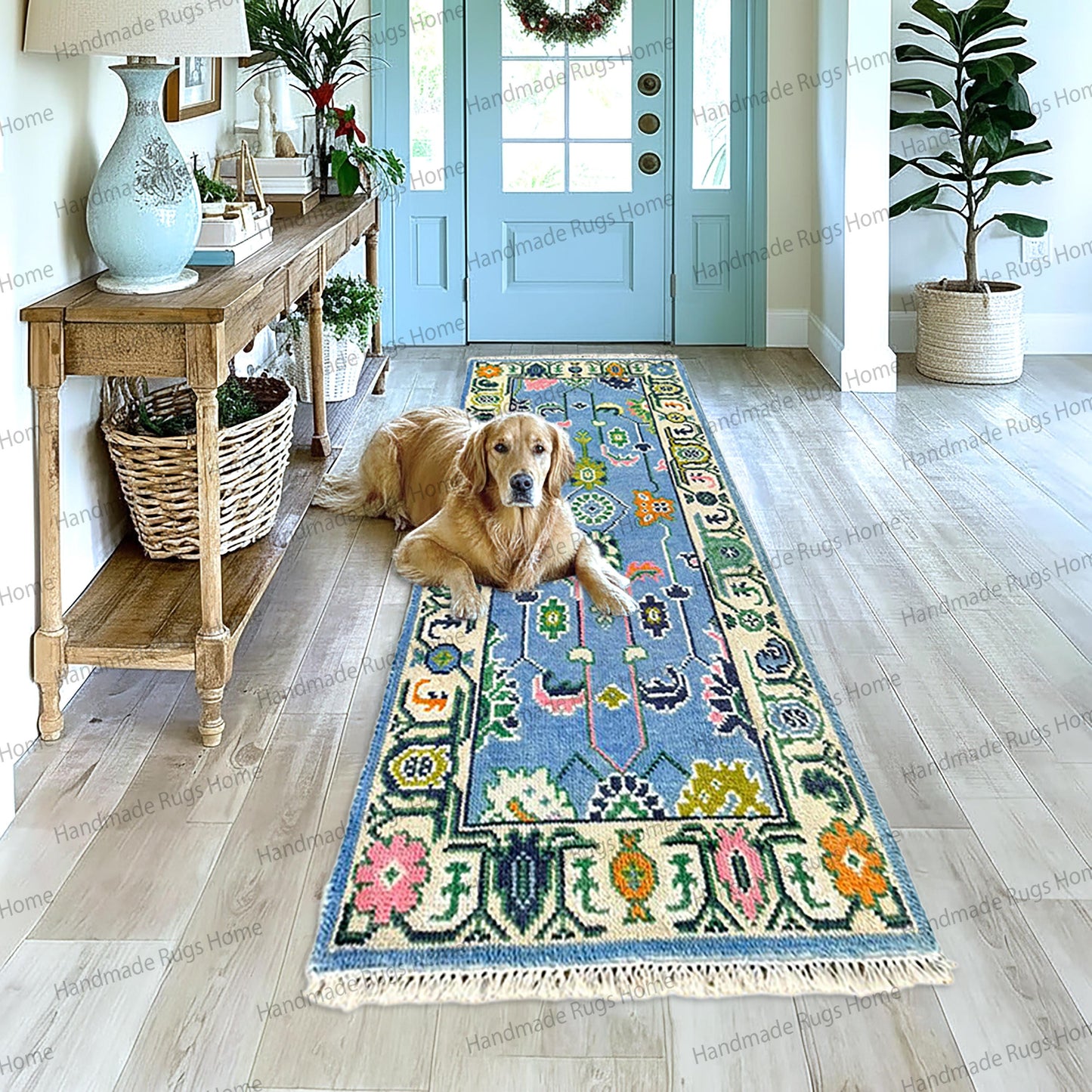 Luxury sky blue area rug, hand-woven for the living room, featuring a multicolor botanical motif and ornate border design.