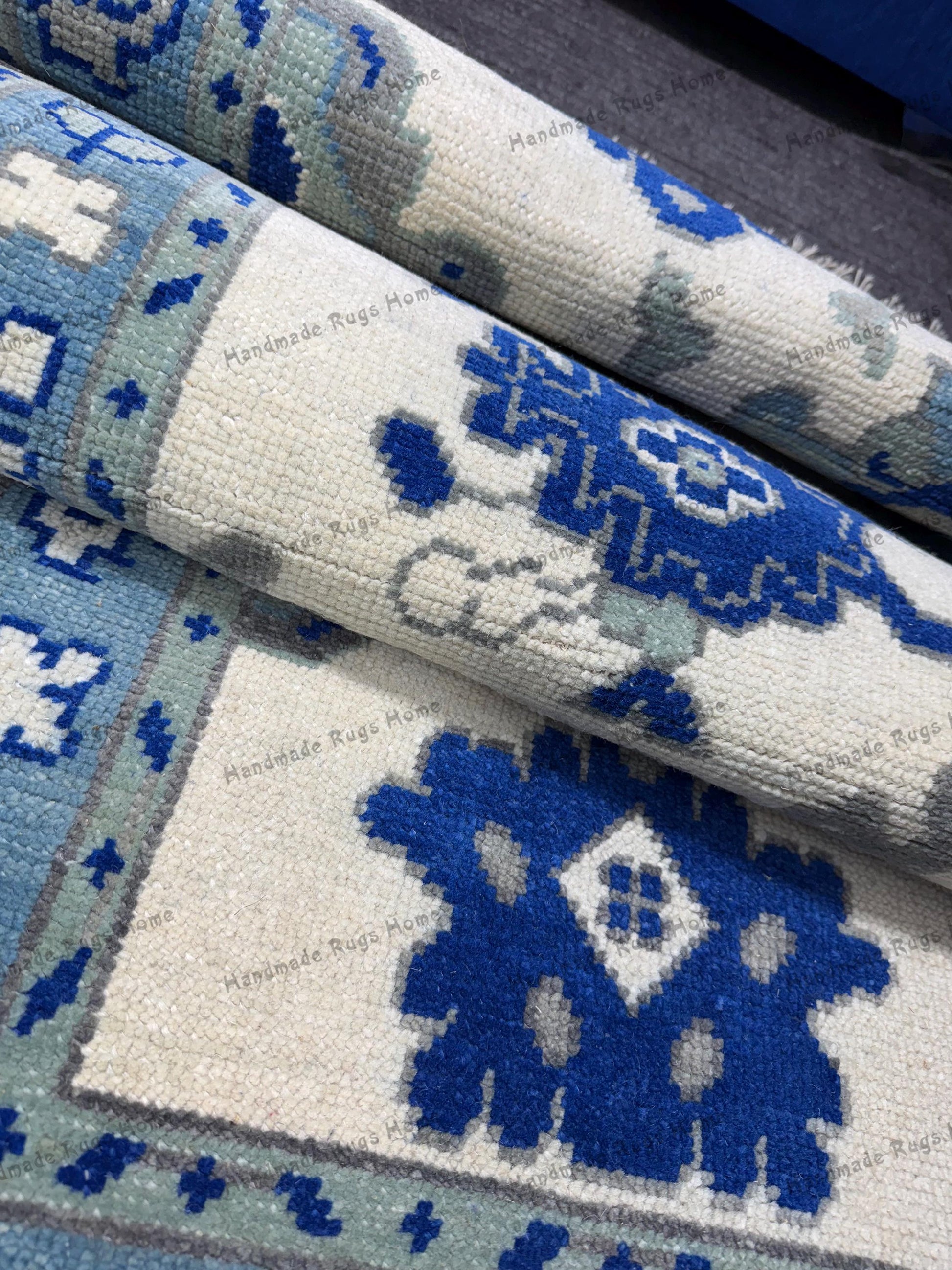 Beautiful handwoven rug featuring floral and tribal designs.