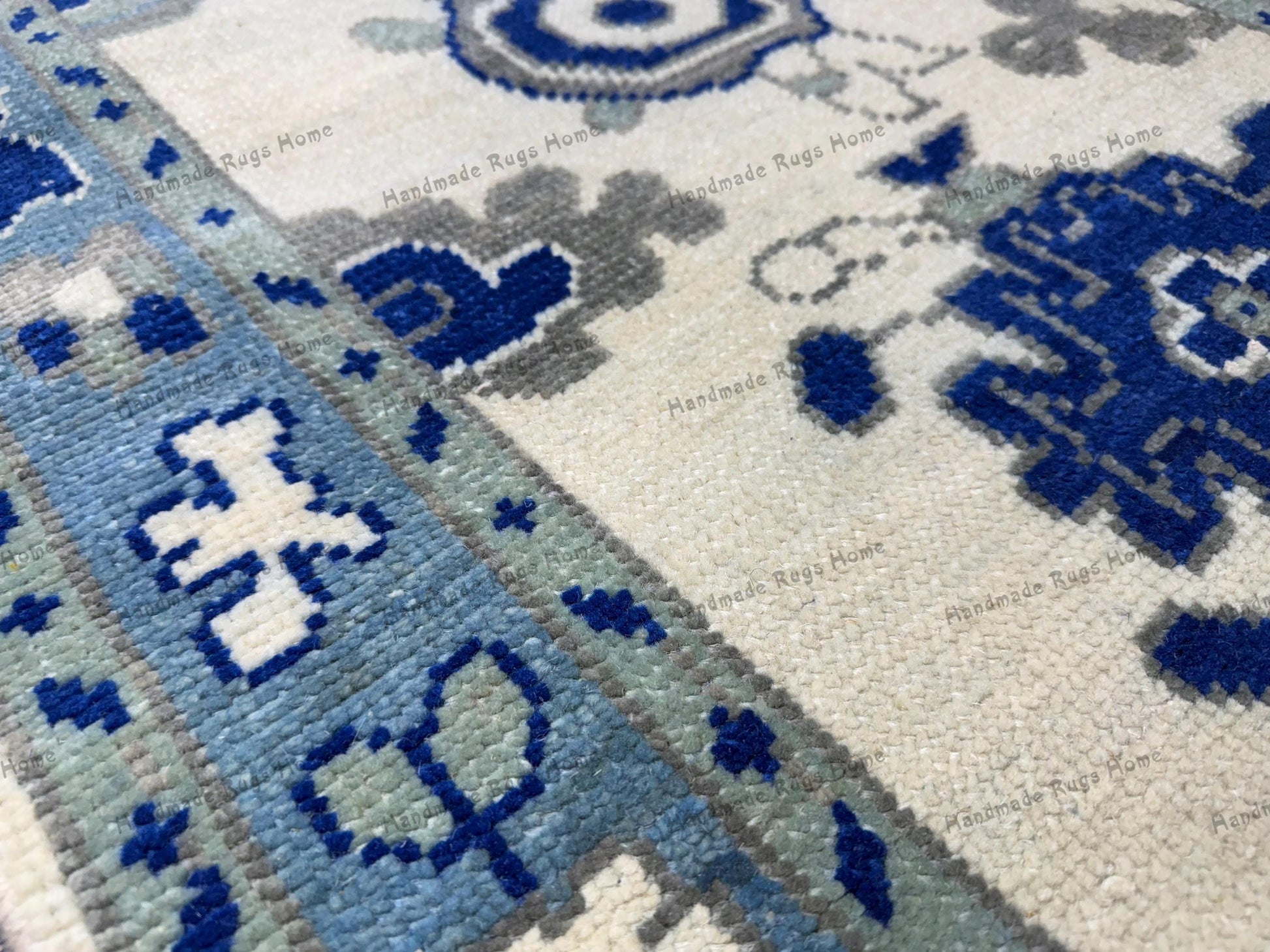 Bohemian runner rug in blue and cream tones.