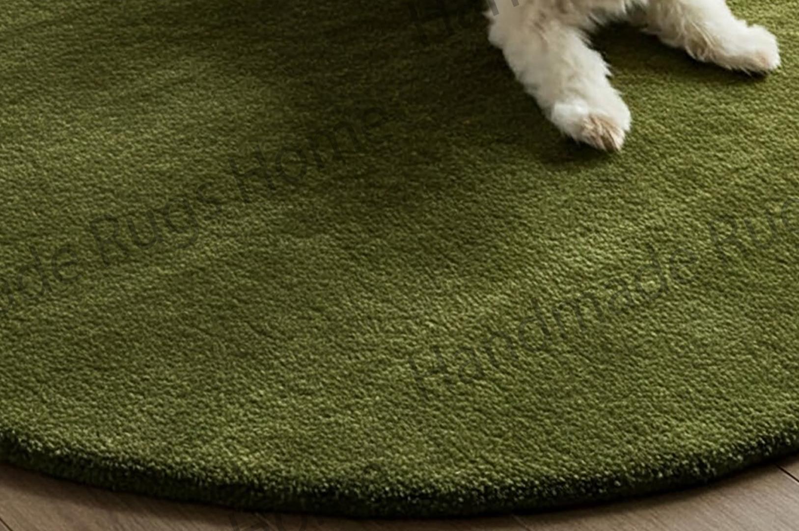 Luxurious oval-shaped wool area rug in an elegant olive green shade.