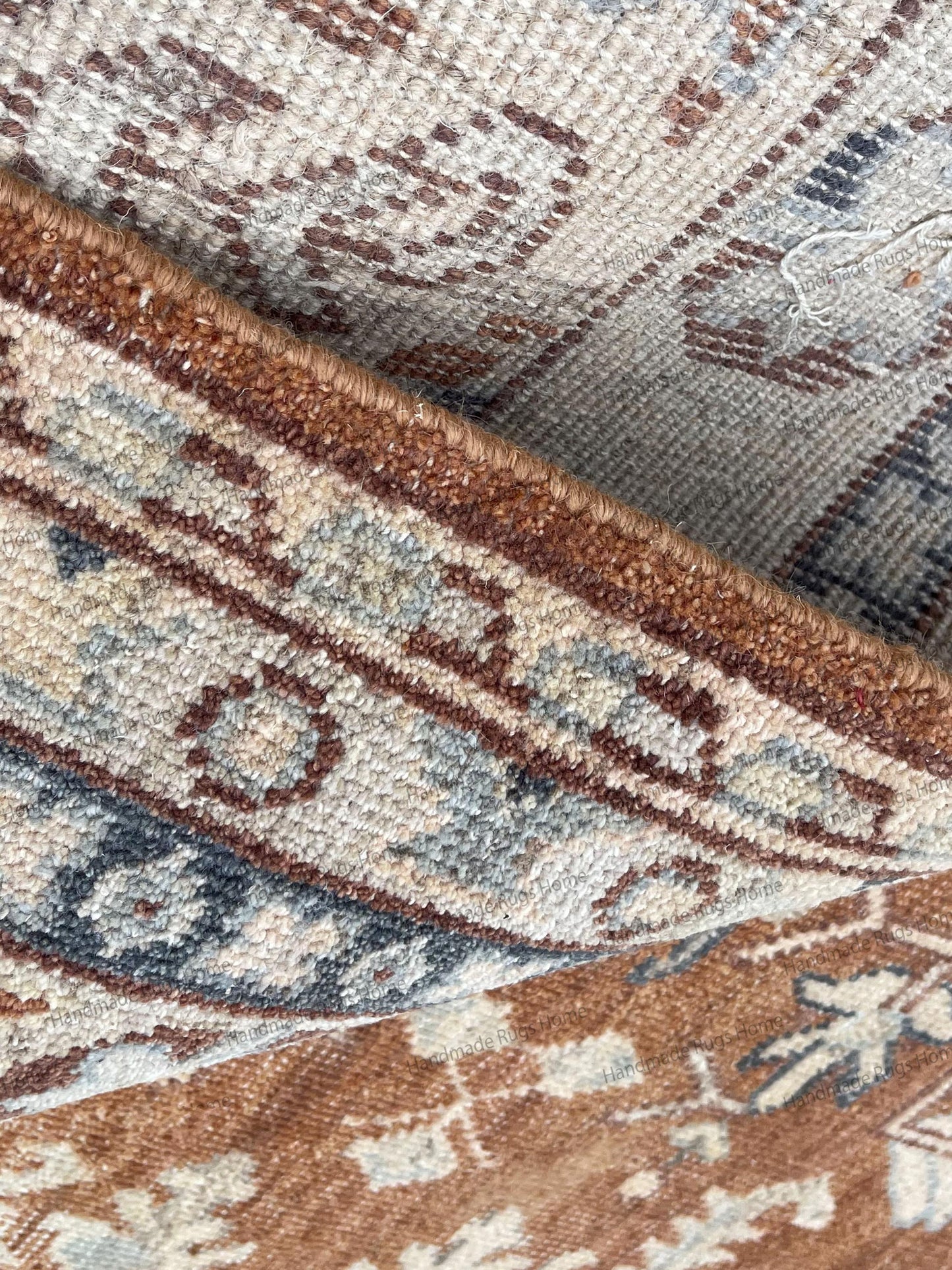 Rectangular Oushak rug showing central medallion and ornate border.