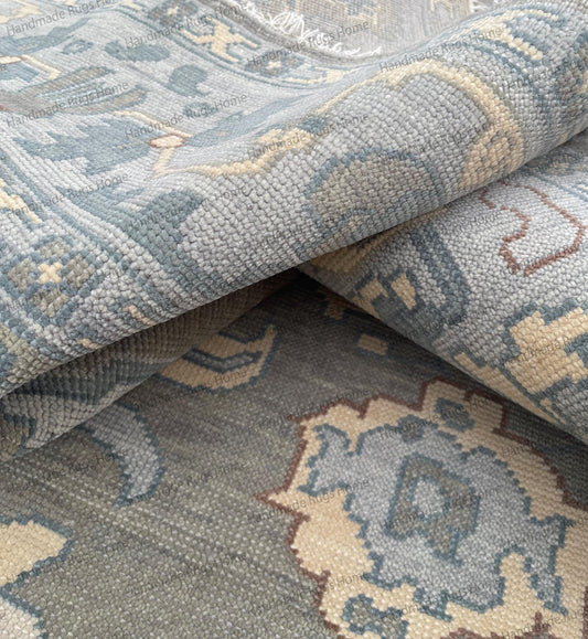 Handmade grey blue Oushak wool rug with traditional oriental pattern