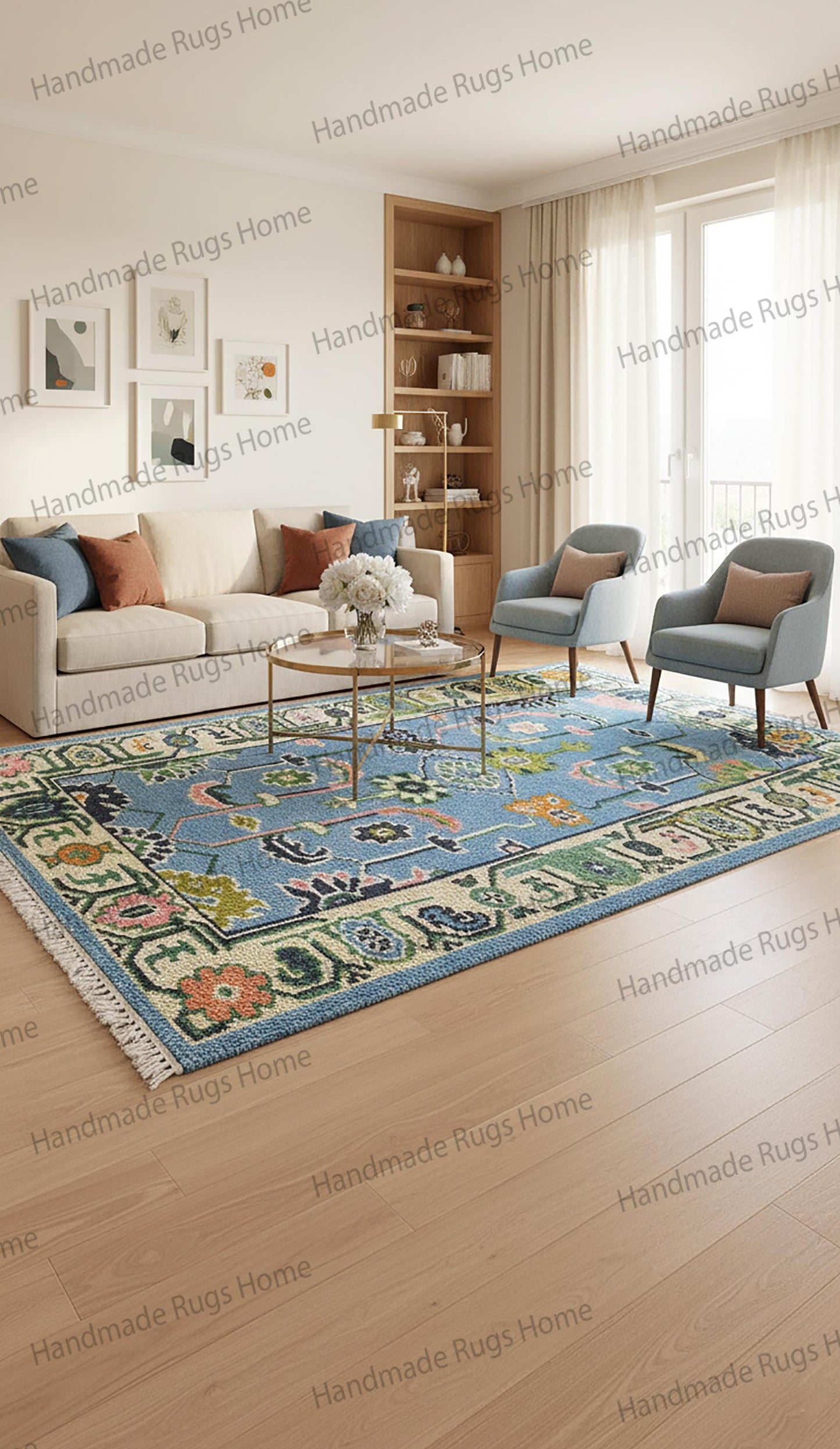 Close-up view of a hand-knotted wool rug featuring a sky-blue field with a repeating, stylized floral and botanical pattern. The vibrant design elements include blush pink flowers, olive green leaves, yellow-orange motifs, and dark gray accents. A prominent, detailed border frames the rug, showcasing intricate geometric and abstract patterns in cream, dark green, and blue.