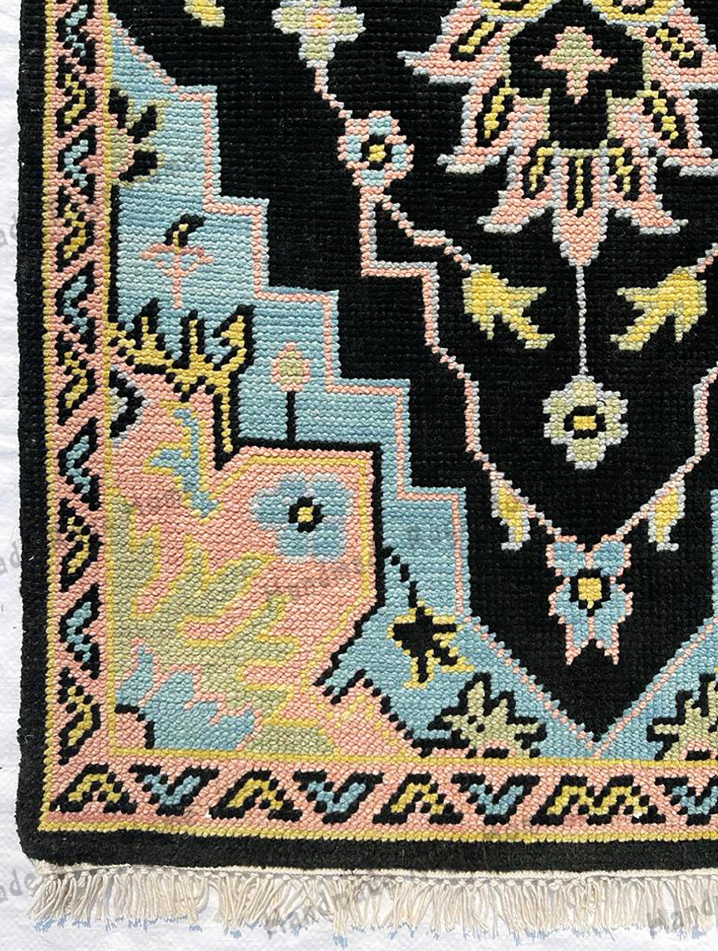 Classic wool rug with traditional patterns and rich colors