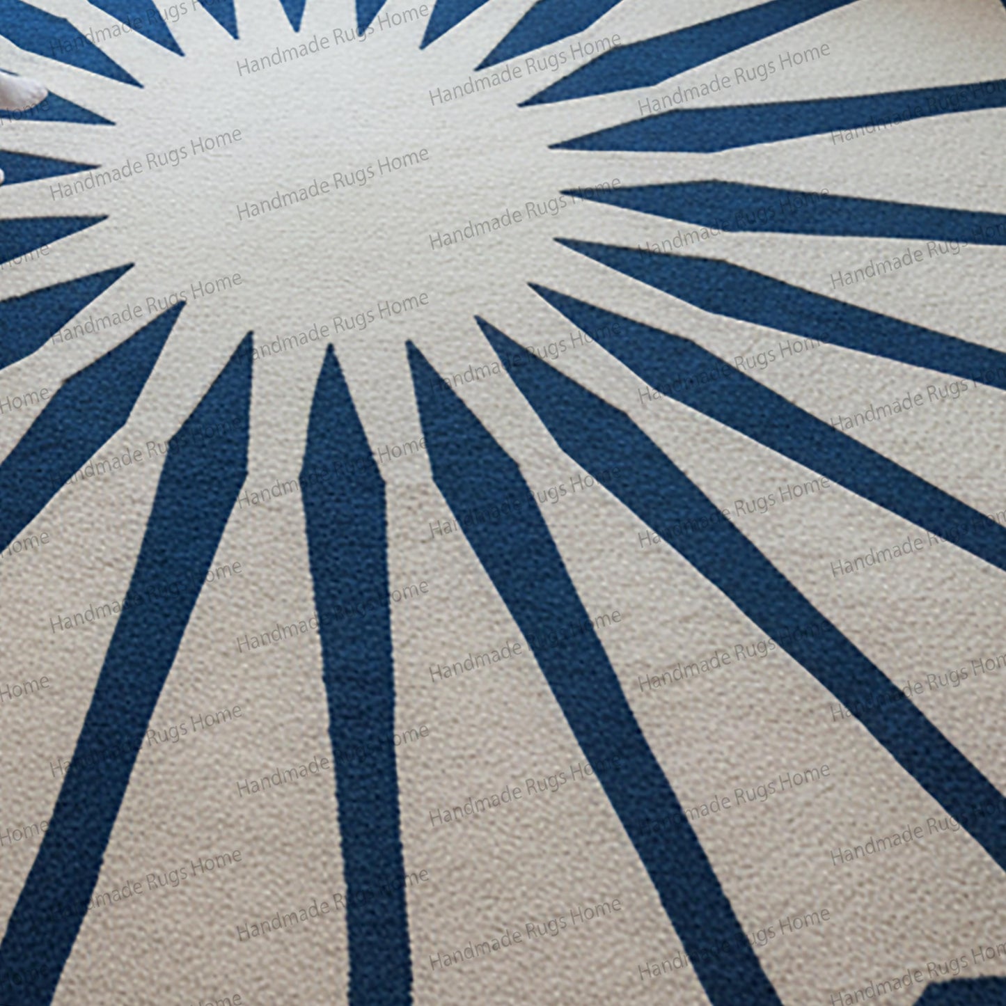 hand tufted blue and ivory circular carpet