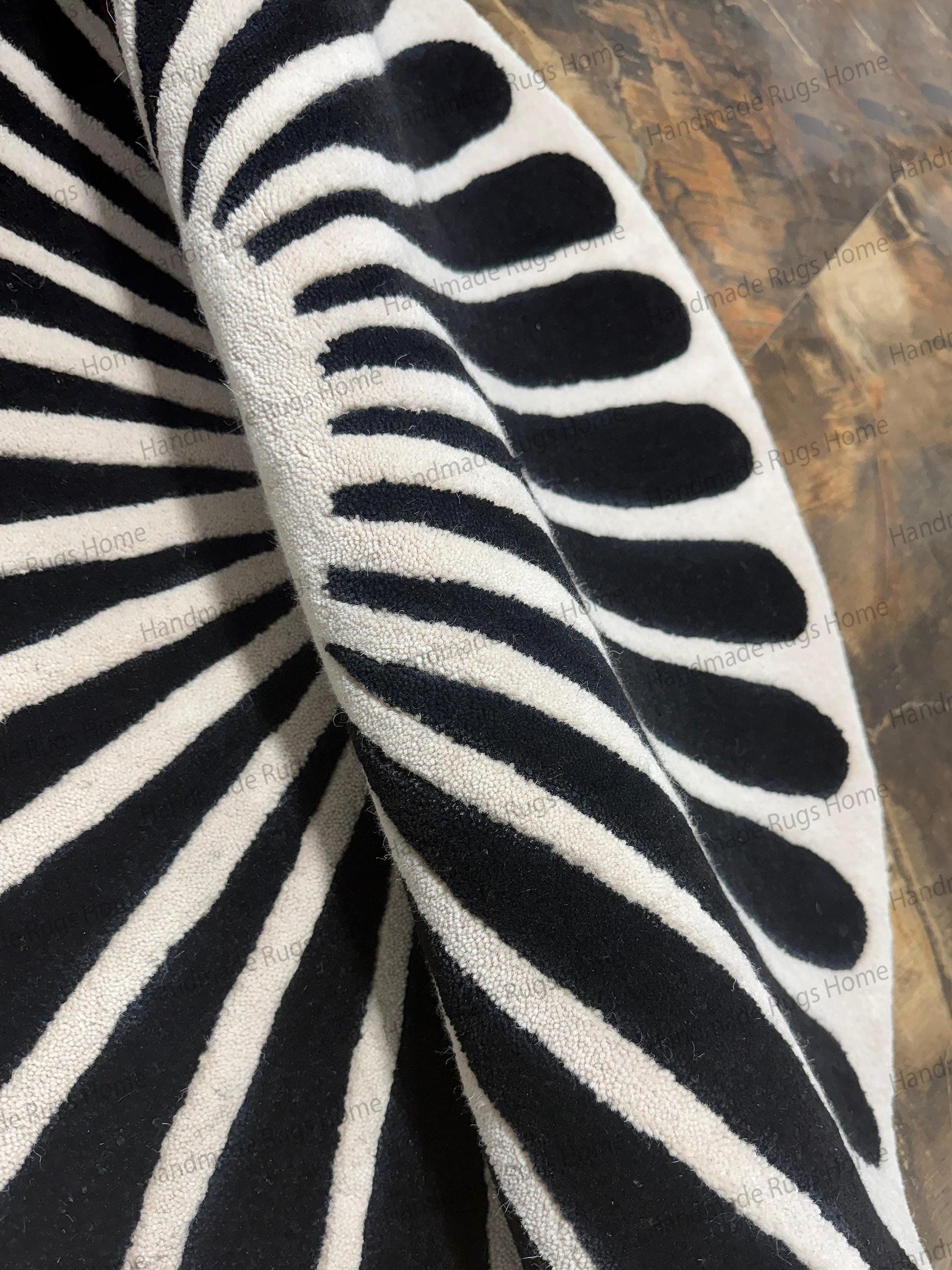 High contrast circular rug for minimalist interior design,

Thick pile soft wool carpet for bedroom or nursery,

Elegant entryway rug round shape with bold graphic art.