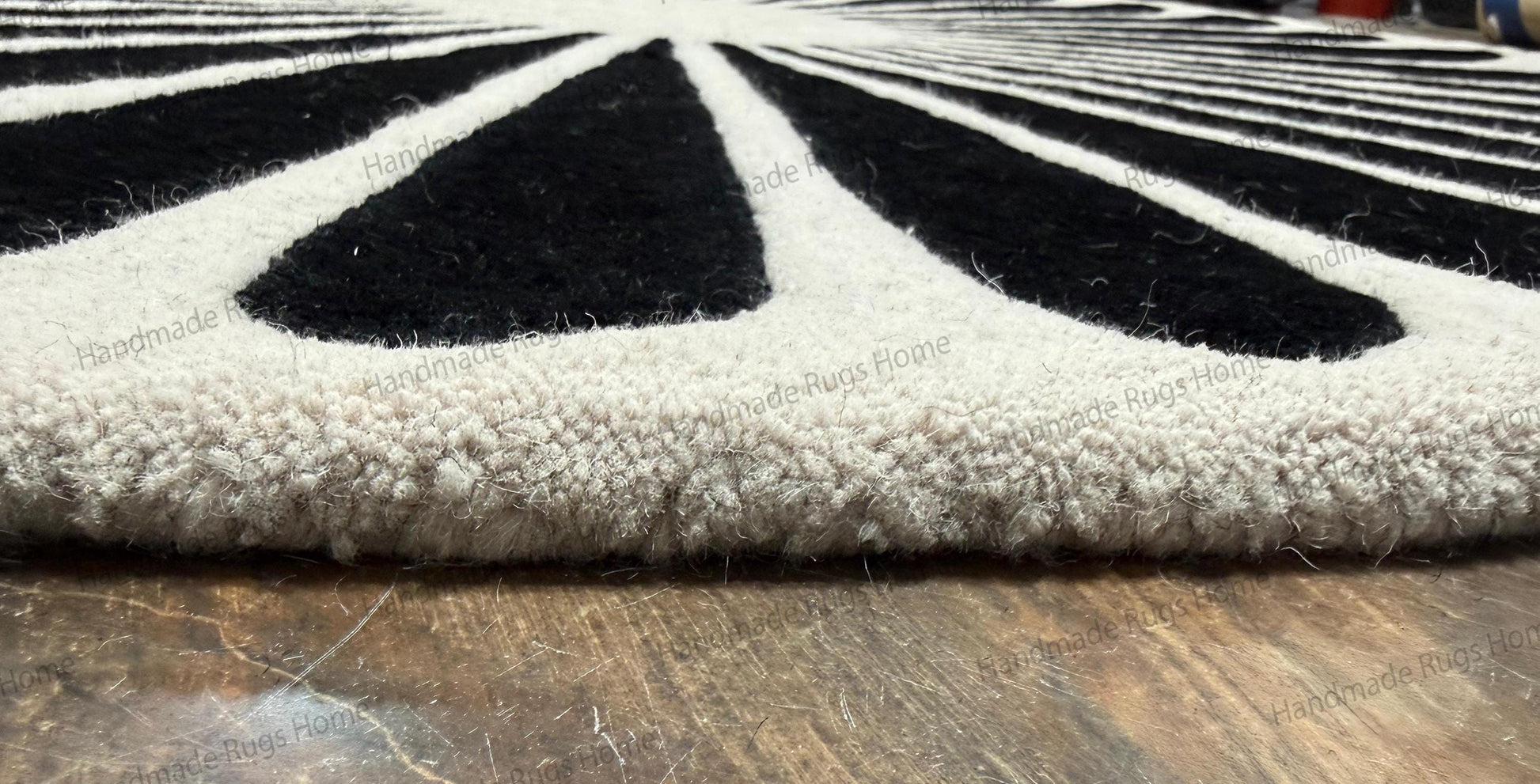luxury black white round wool rug,

modern hand tufted circular carpet,

abstract sunburst wool floor rug,

designer monochrome area rug