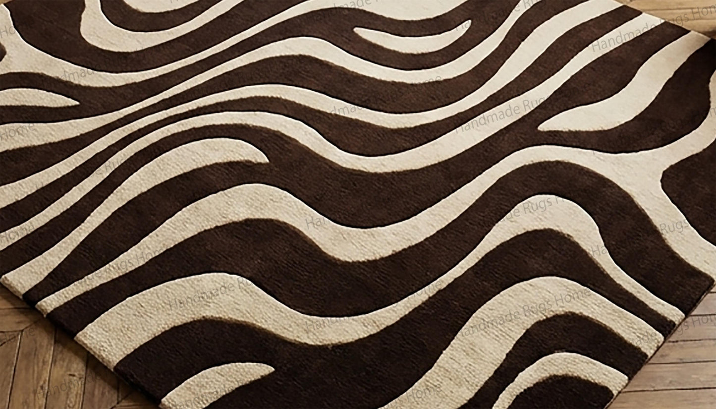 modern abstract brown ivory area rug,

high end sculptural wool rug interior,

designer neutral rug in luxury living room,

contemporary hand tufted rug close view,

premium wool rug with flowing pattern,

artistic wave motif wool carpet,

modern minimalist luxury floor rug,

handcrafted wool rug interior styling,

statement rug for upscale home decor,

plush hand tufted wool area rug