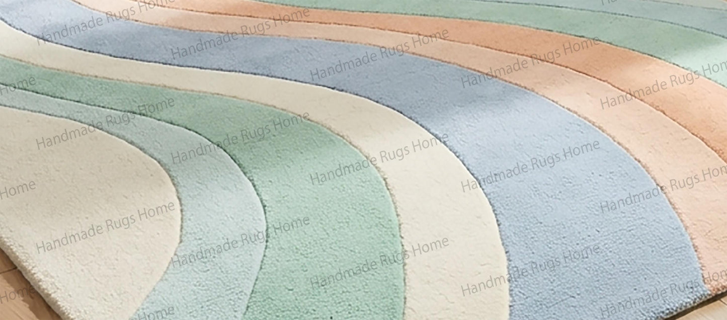 Elegant neutral toned wool floor decor,

Modern abstract rug with soft color palette,

Handcrafted luxury carpet for bedroom styling,

Pastel green blue peach wool statement rug,

High quality tufted wool area rug