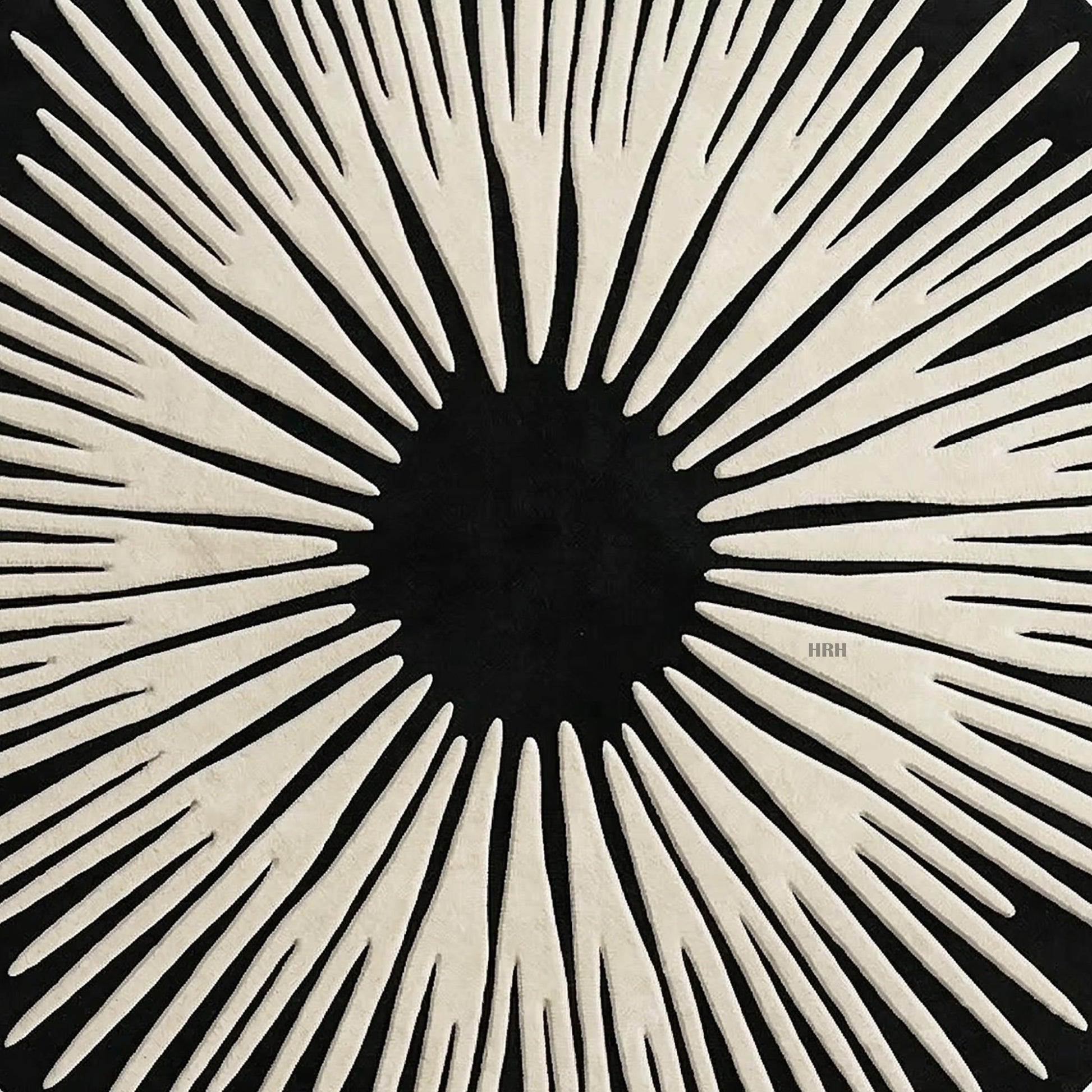 Trendy home decor showing a sun ray inspired tufted mat.

Beautifully woven round rug blending midcentury and contemporary art.

Upscale playroom interior featuring animal poufs and abstract carpet.

Bespoke floor design with radiating light and dark elements.

Handcrafted modern rug providing comfortable stylish base for furniture.