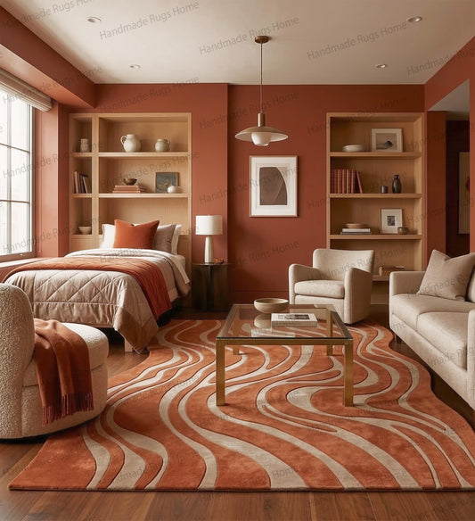 Large abstract wavy tufted rug in terracotta and cream.

Modern living room showcasing burnt orange organic patterned carpet.

Warm earthy bedroom decor featuring a fluid line floor covering.

Handwoven wool mat with desert sand dune inspired design.

Luxury mid-century modern aesthetic rug under a glass coffee table.