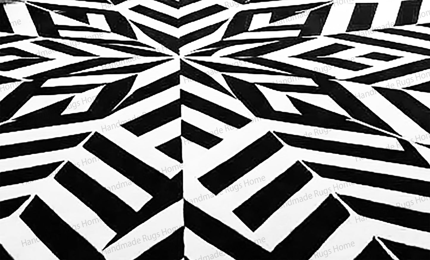 Handcrafted monochrome woolen carpet for bedroom.
