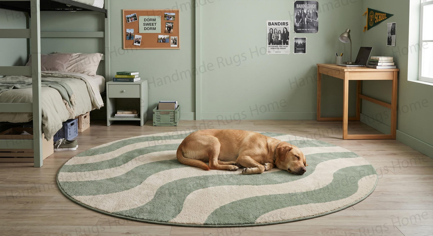 Round hand tufted wool rug featuring abstract sage green and beige wavy lines.

Modern circular area rug with organic minimalist wave pattern on a white background.

Contemporary biophilic design round carpet in pastel eucalyptus and cream colors.

Luxury hand carved wool floor covering showcasing fluid nature-inspired shapes.

Abstract topographical style round rug for contemporary living room decor.

High end geometric circle rug in sage green hue for home styling.