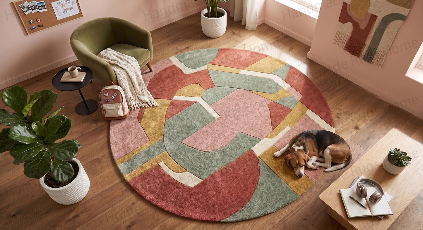 Modern hand-tufted round wool rug featuring abstract geometric blocks in sage green and terracotta.

Circular area carpet with contemporary minimalist pattern in blush pink and mustard gold tones.

Premium handcrafted 100-percent wool rug with a plush geometric design for living room decor.

Artistic round floor rug with earthy terracotta rust and soft sage green blocks on hardwood floor.

Mid-century modern round rug styling an elegant interior entryway with warm wall colors.