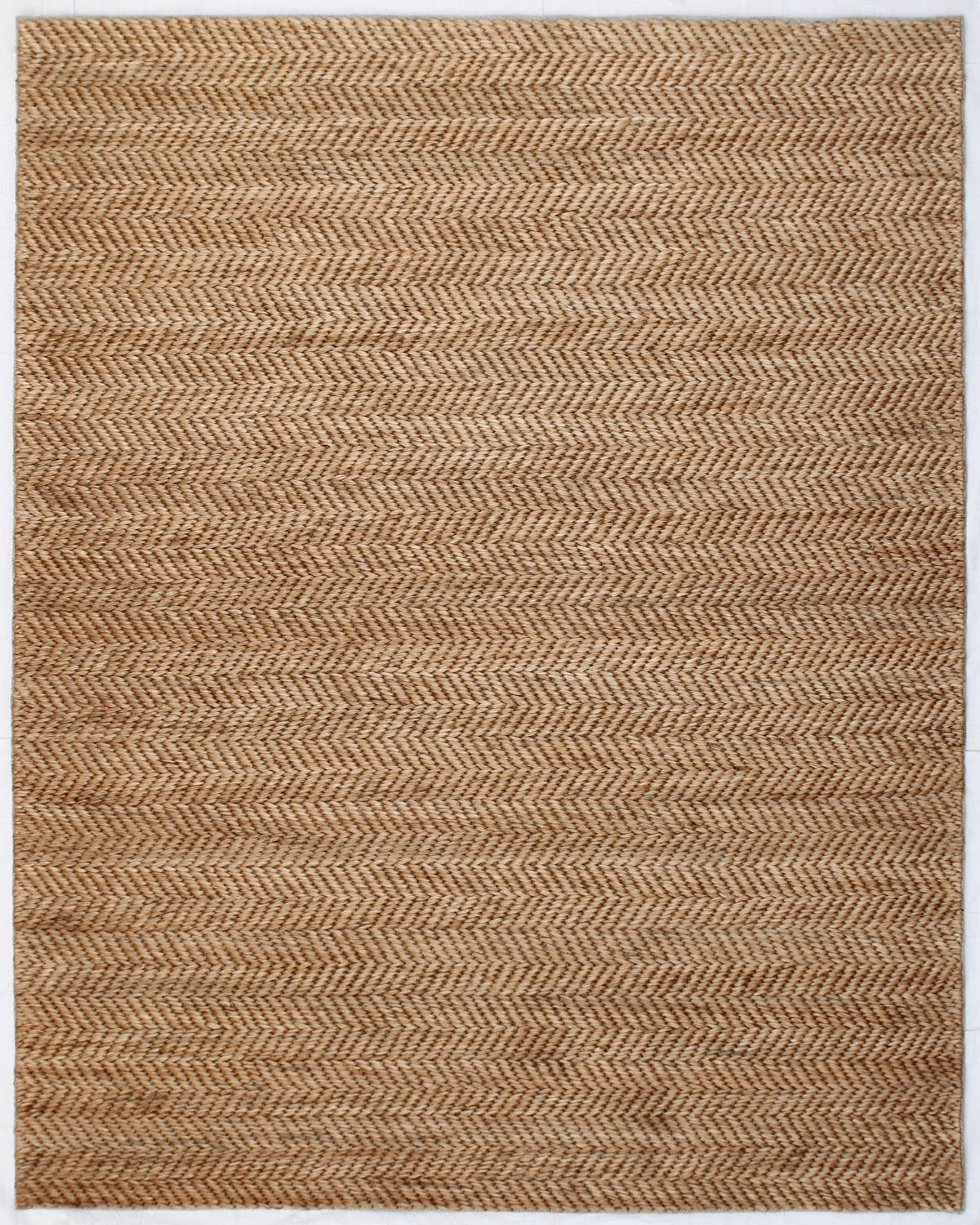 3x5 natural jute area rug with repeating herringbone pattern shown in full